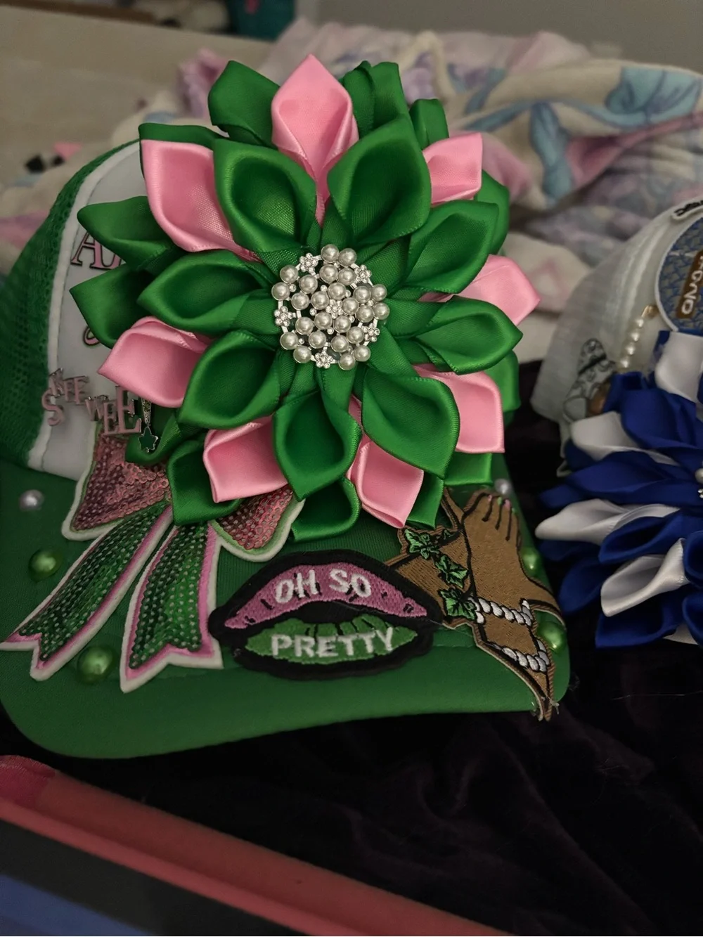 Green Trucker Hat with Pink & Green Ribbon Flower